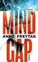 "MIND GAP", "ANNE FREYTAG", "ROMAN". Große Buchstaben, dunkles Gesicht mit leuchtenden Farben, neuronale Strukturen., Buch