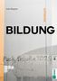 Texte: Ines Wagner, Denkbuch, BILDUNG, "Fuck Schule 20258". Ein Graffiti auf einer Betonwand mit schlichten Farben., Buch