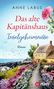 „Anne Labus: Das alte Kapitänshaus - Inselgeheimnisse, Roman.“ Ein Weg führt an einem blühenden Garten zum Haus am Meer., Buch