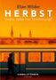 Elian Wilder, HERBST. Liebe oder nur Erinnerung? Silhouette vor orange beleuchtetem Zug, Skyline mit Türmen im Hintergrund., Buch
