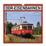 "DDR-EISENBAHNEN", "2027". Ein roter Zug fährt durch eine grüne Landschaft mit blühenden Pflanzen., Kalender