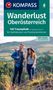 Text: "Wanderlust Oberösterreich, 120 Traumpfade, GPS-Daten zum Download." Zwei Menschen auf einem grünen Hügel., Buch