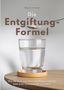 „Die Entgiftung-Formel“ von Mara Levenson. Ein Glas Wasser steht auf einem Tisch, darüber ein Löffel mit Pulver.