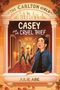 Dieser Entwurf zeigt den Text: "CASEY AND THE CRUEL THIEF" und "JULIE ABE". Eine Gruppe Kinder erkundet einen Flur., Buch