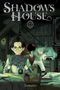 "Shadows House 12" und "Somato". Zwei Personen in einem düsteren Raum, eine arbeitet am Tisch, die andere steht im Hintergrund., Buch