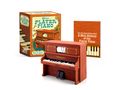 "Mini Player Piano", "With Sound & Moving Keys!", "Let the Good Times Roll: A Mini History of the Player Piano". Mini-Piano, Verpackung.
