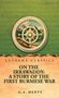 Text: "Lushena Classics", "On the Irrawaddy: A Story of the First Burmese War", "G.A. Henty". Hintergrund: Kompass und Berge., Buch