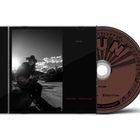 Texte: "rise", "Melissa Etheridge".  
Auf dem Cover: Person mit Gitarre sitzend, Landschaft im Hintergrund. CD mit stilvollem Design.