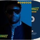 Text: "LOTTERY", "SHAGGY". Ein Mann mit Sonnenbrille, dunkler Hintergrund, CD-Hülle und CD mit Titel und Namen.