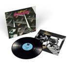 Album mit Schriftzug "DOUBLE EXPOSURE" und "JOE CHAMBERS"; Schallplatte und Fotos liegen daneben.