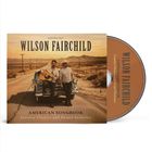 „Wilson Fairchild, American Songbook, Country Classics and Gospel Favorites“. Zwei Männer mit Gitarre vor einem Auto.
