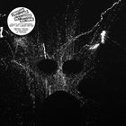 Der Text oben links: "Christian Prommer Rhythmique Nocturne." Darunter weiße Spritzer auf schwarzem Hintergrund.