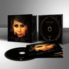 Text: "ALISON MOYET THE TURN". CD-Hülle und CDs mit Porträt einer Frau, dunkler Hintergrund, eleganter Stil.