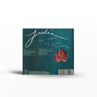 „Julie, an album by Julia Cumming“ steht in geschwungener Schrift. Darunter Trackliste und eine rote Blume auf türkisem Grund.