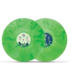 "The Sims 25" steht auf zwei grünen Schallplatten mit marmoriertem Muster. Beide haben künstlerische Etiketten.
