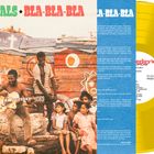 MAJTALS* BLA-BLA-BLA. Classic Reggae. Rasta yellow color vinyl mit einem Foto von Personen vor einem bunt bemalten Holzhaus.