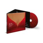 Text "Gotan Project Best Of". Cover zeigt roten Stoff in Nahaufnahme. CD-Hülle und rote CD sind zu sehen.