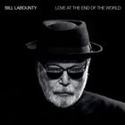 Text: "BILL LABOUNTY" und "LOVE AT THE END OF THE WORLD". Ein Mann mit weißem Bart trägt Hut und Sonnenbrille.
