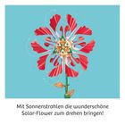 Mit Sonnenstrahlen die wunderschöne Solar-Flower zum Drehen bringen! Illustration einer rot-weißen Blume mit Zahnrädern.
