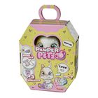 "Pamper Petz," "Adopt Me," "Drink + Wet," "Love Me!," "Boy or Girl?" Ein niedliches Tier auf gelber Verpackung mit rosa Details.