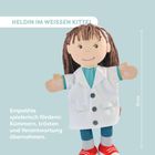 Text: "HELDIN IM WEISSEN KITTEL", "Empathie spielerisch fördern: Kümmern, trösten und Verantwortung übernehmen." Handpuppe im Arztkittel.