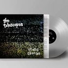Auf dem Cover steht "the telescopes static charge". Eine durchsichtige Vinyl-Schallplatte ragt heraus.