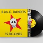 Text: "B.M.X. BANDITS", "15 BIG ONES". Gelber Hintergrund, roter Stern, lächelnder Totenkopf. Schallplatte sichtbar.