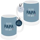 Text: "Bester Papa der Welt", "Von:", "Du bist einfach der Beste".  
Zwei blaue Tassen mit Anhängern.