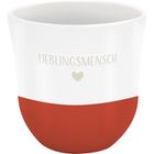 "LIEBLINGSMENSCH" über einem kleinen Herz auf einer Tasse mit weißem oberen Teil und rotem unteren Bereich.