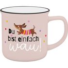 Text: "Du bist einfach wau!"
Illustration: Fröhlicher Hund mit buntem Pullover, umgeben von bunten Punkten auf einer Tasse.