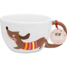 Auf der Tasse steht "Für Dich", sie zeigt einen fröhlichen Cartoon-Dackel mit einem bunten Pullover.