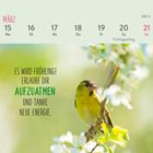Märzkalender mit Daten und Text "Es wird Frühling! Erlaube dir aufzuatmen und tanke neue Energie." Ein Vogel auf einem blühenden Zweig.