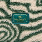 Etikett "Feine Papeterie COPPENRATH" auf grünem Stoffmuster mit weißen Spiralen.