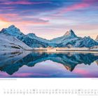 Januar 2023, Freitag beginnt der Monat. Winterliche Berglandschaft mit spiegelndem See und buntem Himmel.