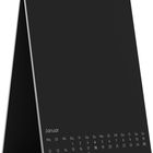 Text: "Januar", Wochentage Mo-So, Tage 1-31. Tischkalender mit Spiralbindung.