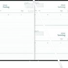 Kalenderseiten für den 1. bis 3. Januar 2027 mit Wochentagen und Feiertagsangaben. Eine silberne Stift liegt darauf.