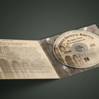 CD mit Aufschrift: "Orbis Sonus: Brevia, Aurel von Eschenbach". Cover zeigt antike Architektur.