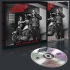 "DIRTY TRICKS", "NOT GONNA STOP" und Liedtitel auf CD. Schwarz-weißes Bandfoto mit Motorrad und lässiger Kleidung.