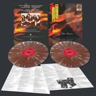 Tokyo Blade, Burning Down Paradise. Zwei bunte, marmorierte Vinyl-Schallplatten liegen auf Textblättern.