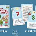 "24 x Wichtelzauber" Kartenbox mit 24 Karten. Motive: Weihnachtswichtel, Tannenbaum, winterliche Illustrationen.