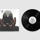 Texte: "WRITTEN FOR ORAL", "SAINT AJI" und "JUVONN", Bild: Eine Silhouette hält den Kopf, ein WLAN-Symbol erscheint darauf.