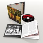 CD-Cover mit "golden earring" in roter Schrift, daneben eine CD mit demselben Text. Ein schwarz-weißes Bandfoto liegt bei.