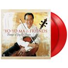 "YO-YO MA & FRIENDS: Songs of Joy & Peace" steht über einem Porträt von jemandem mit einem Cello. Zwei rote Vinyl-Schallplatten.