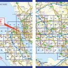 Stadtkarte mit Gitterfeldern; Text: "LARGE SCALE 4 5 CITY CENTRE". Zeigt Straßennetz und Städte wie Liverpool.