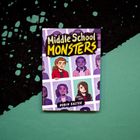 "Middle School Monsters" und "Robin Easter" auf lila Cover mit gezeichneten Figuren in einem Raster.
