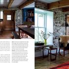 Texte: "Above: The family has changed... collected over many years."  
Steinwände, Holzbalken, Tisch, Stuhl, helle Fensterbank mit Blumen.