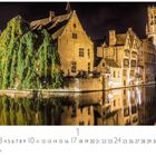 Brügge. Monatskalender mit Zahlen von 1 bis 31. Nachtansicht historischer Gebäude am Wasser mit Spiegelung.
