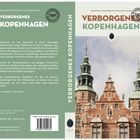 "Verborgenes Kopenhagen" von Johanne Steenstrup und Klaus Dahl; unter einem Foto historischer Türme auf einem Buchcover.
