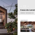 "Casa do Laranjal" ist der Titel. Eine moderne Holzhütte mit Glasfront und Orangenbaum davor.