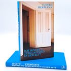 Aufschrift: "JUDITH HERMANN, ICH MÖCHTE ZURÜCKGEHEN IN DER ZEIT". Buchcover mit offenem Türmotiv.